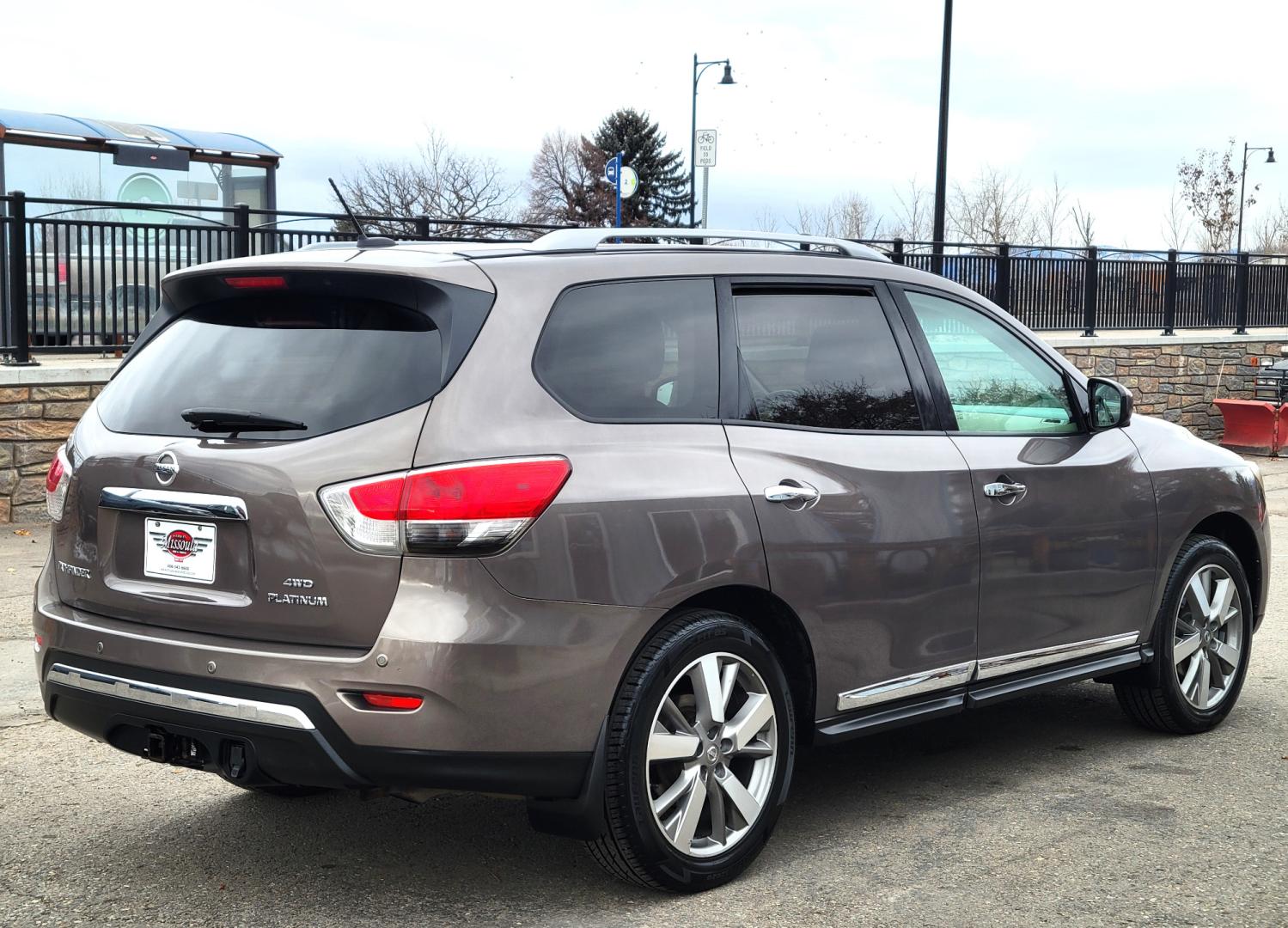 2013 Brown /Tan Nissan Pathfinder Platinum (5N1AR2MM1DC) with an 3.5L V6 engine, Automatic / CVT transmission, located at 450 N Russell, Missoula, MT, 59801, (406) 543-6600, 46.874496, -114.017433 - 4 Wheel Drive SUV. Power Sunroof. 3rd Row Seating. Heated Leather Front and Middle Seats. Power Front Seats. DVD Screens in Headrests. Navigation. Bluetooth. Backup Camera. AM FM CD DVD XM. Heated Steering Wheel. Towing. - Photo#6